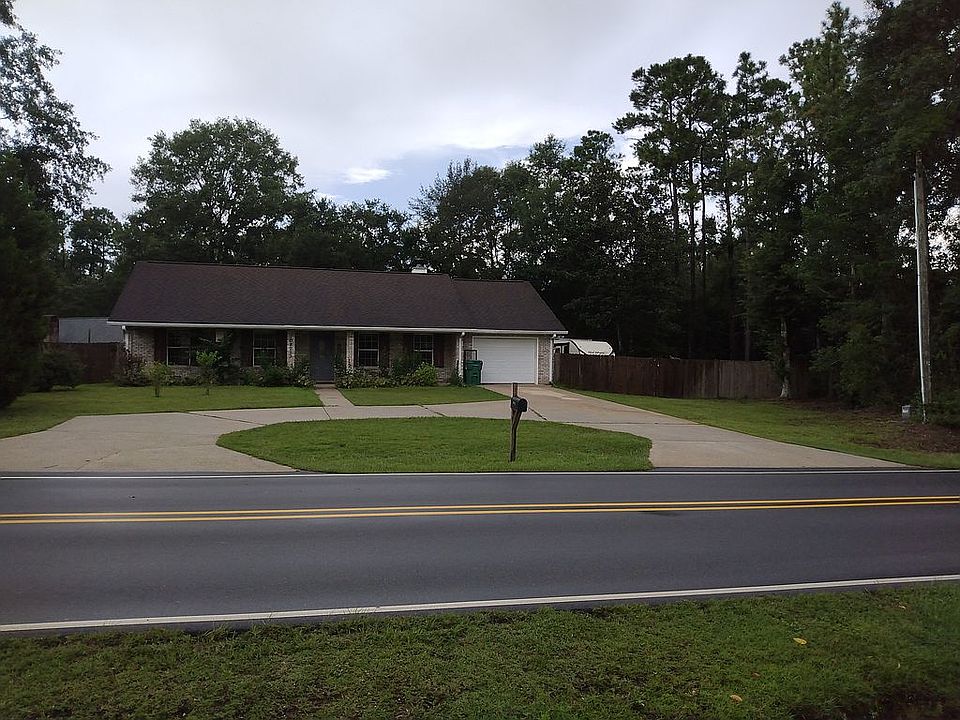 House + side lot fenced in