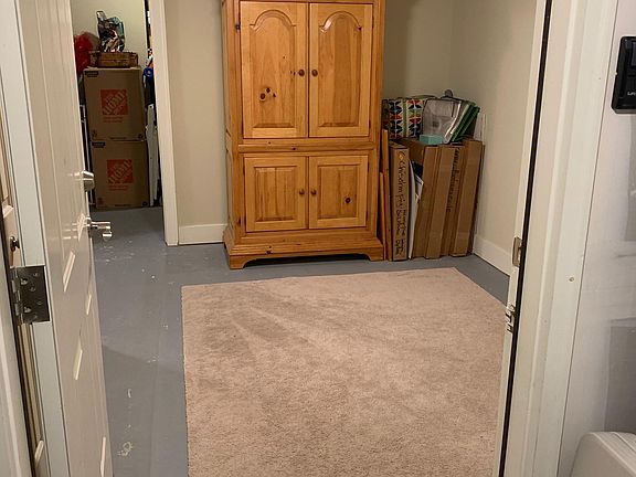 Small basement area with attached storage area