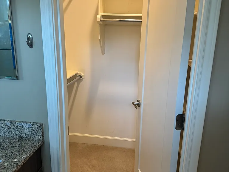 Primary bedroom with locking walk-in closet