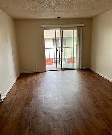 Living room, dining room and balcony
