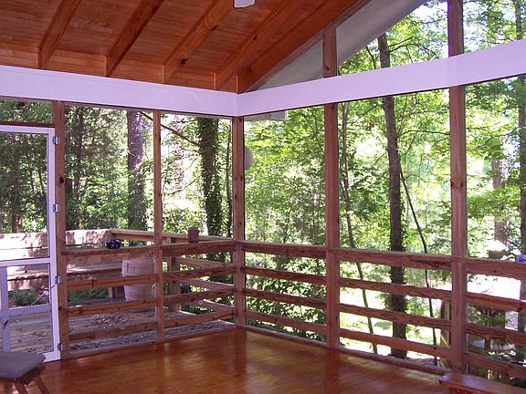 Fantastic screened porch that overlooks the wooded hillside