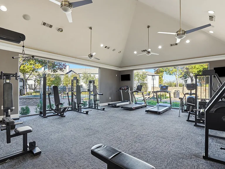 Large Fitness Center with treadmills and other equipment