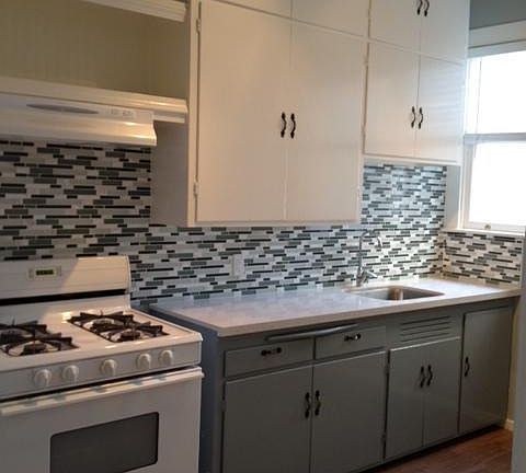 Spacious, kitchen with gas stove a lots of cabinet space.