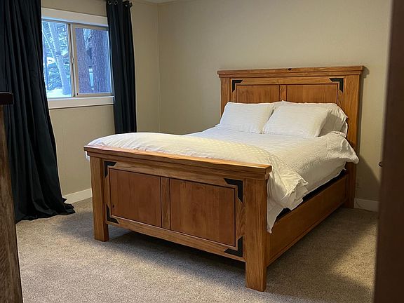 Downstairs bedroom with brand new carpet