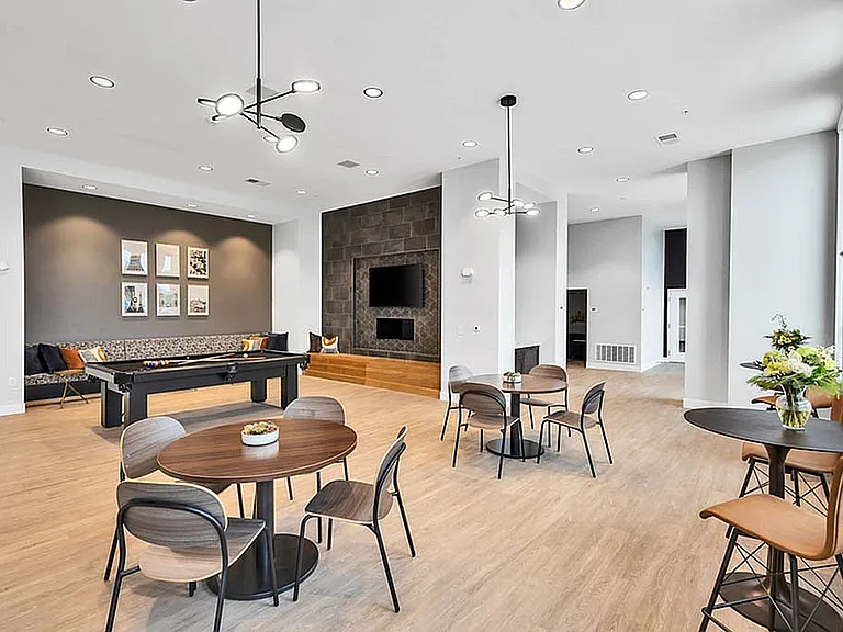 Community Lounge Featuring a Pool Table