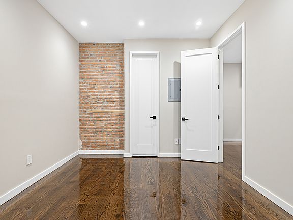 4th image of 61 E 7th St APT 1B