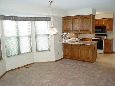 4th image of 9583 Woodsfield Cir N