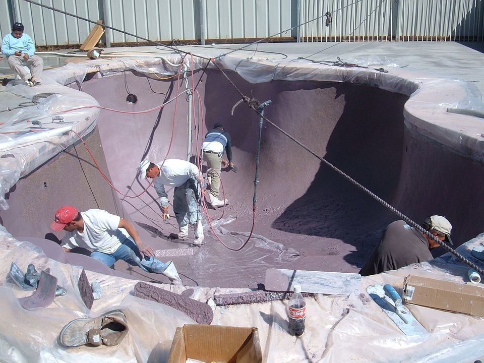The pool having new tile and pebbletec applyied.