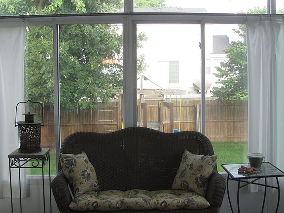 3 season room with picture windows on 3 sides