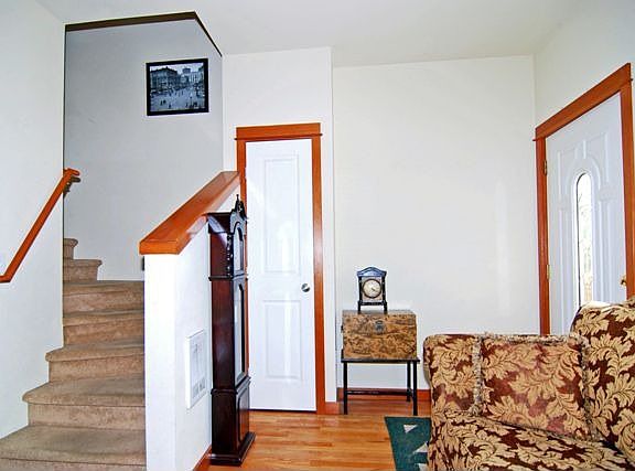 Main level entry, hardwood entry, natural wood trim