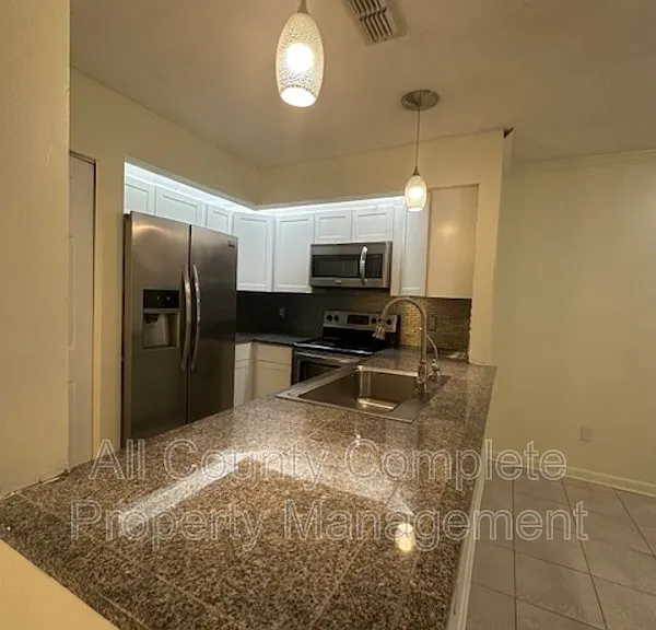 8550 Sturbridge Cir W — Photo 16