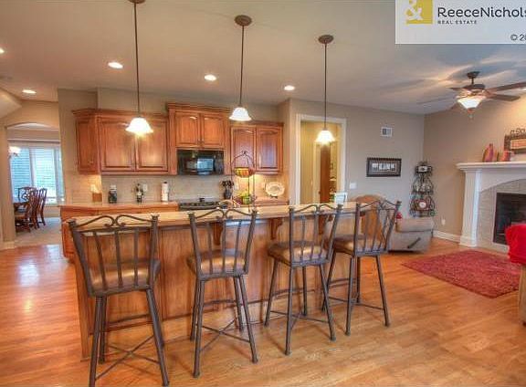 Kitchen island fits four bar stools comfortably.