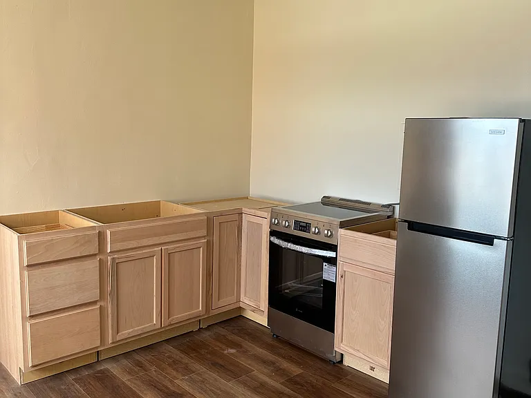 Envision butcher block countertops with open shelving above.