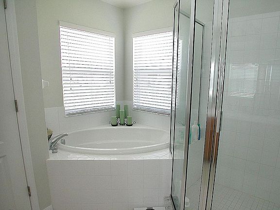 Master bath with whirlpool tub & glass shower