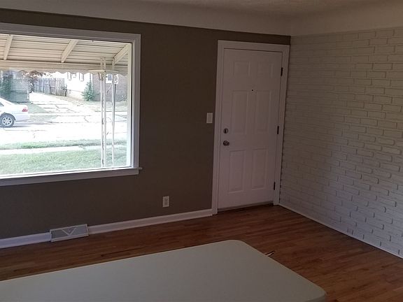Living room with large bay window.