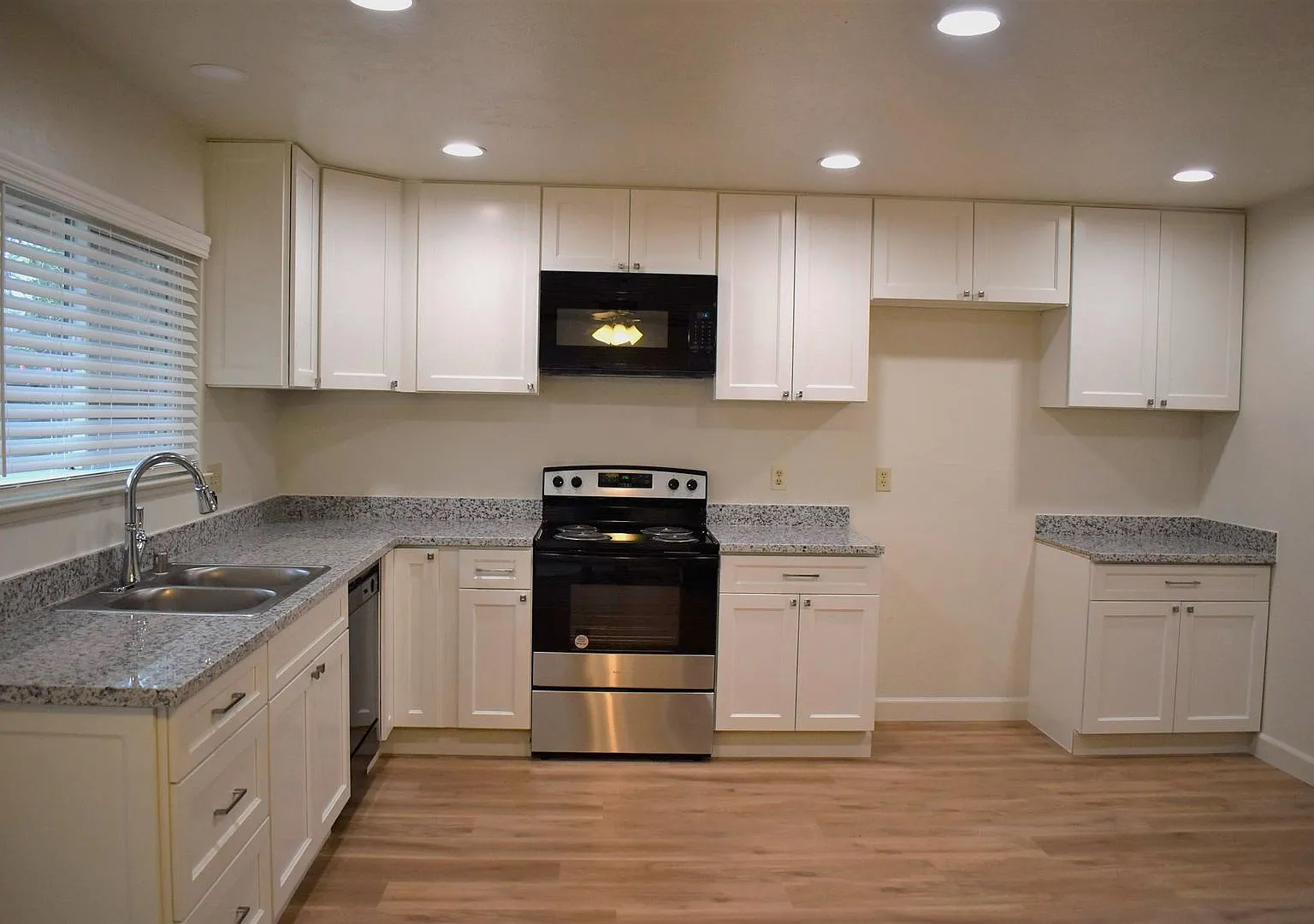 4-bedroom home with luxury vinyl flooring and much more! — Photo 1