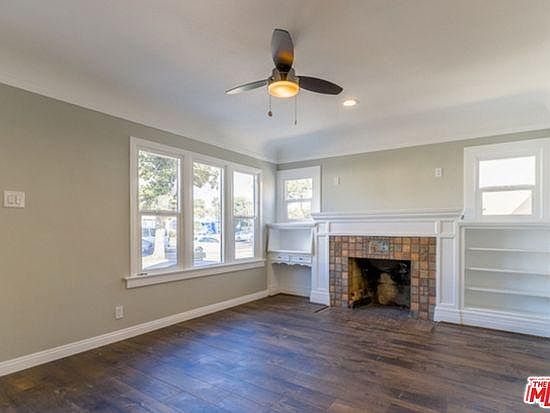 Lovely decorative Batchelder fireplace.