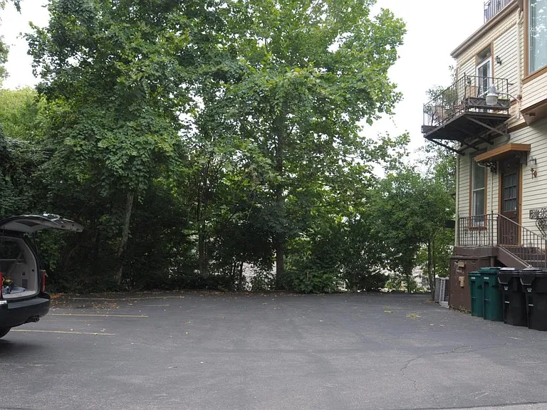 Off street parking behind the house. 2 spots for the 1st Floor Apartment