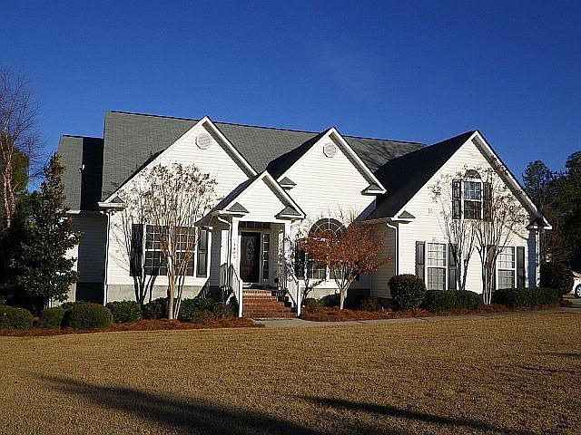 House sits on large corner lot
