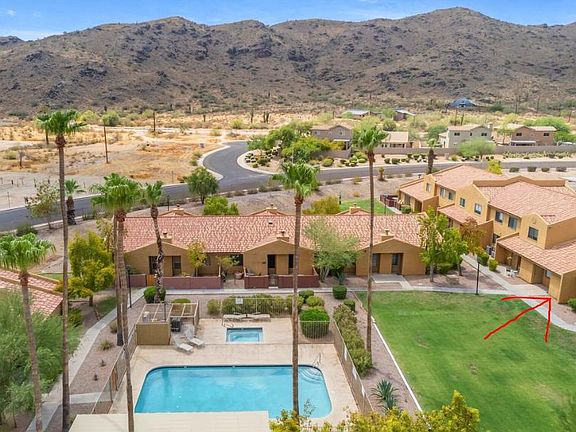 Large open green space in front of unit