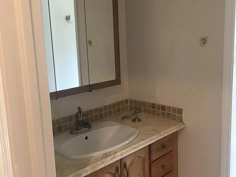 2nd Bathroom, upstairs view from door of its sink and medici
