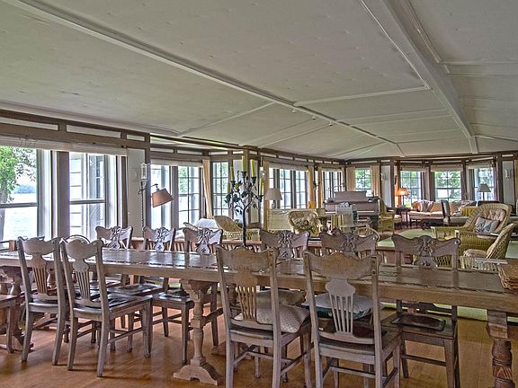 Table for 12 people provides a wonderful dining experience with lake views galore!