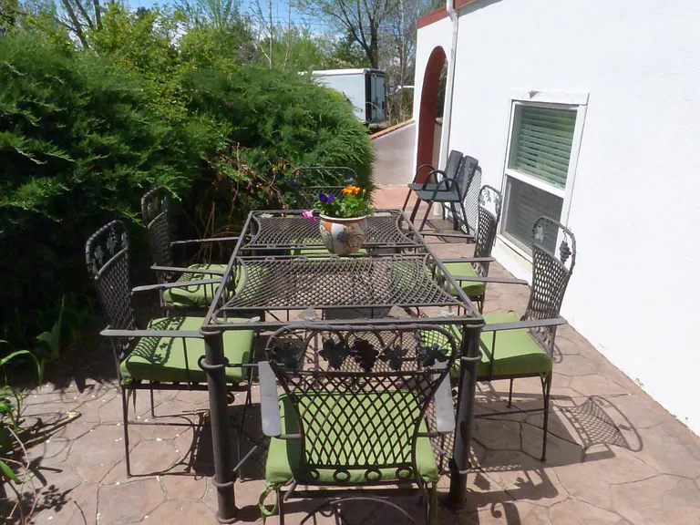 Front patio eating area, right by font door. Another eating area is in the back patio too, as well as balcony.