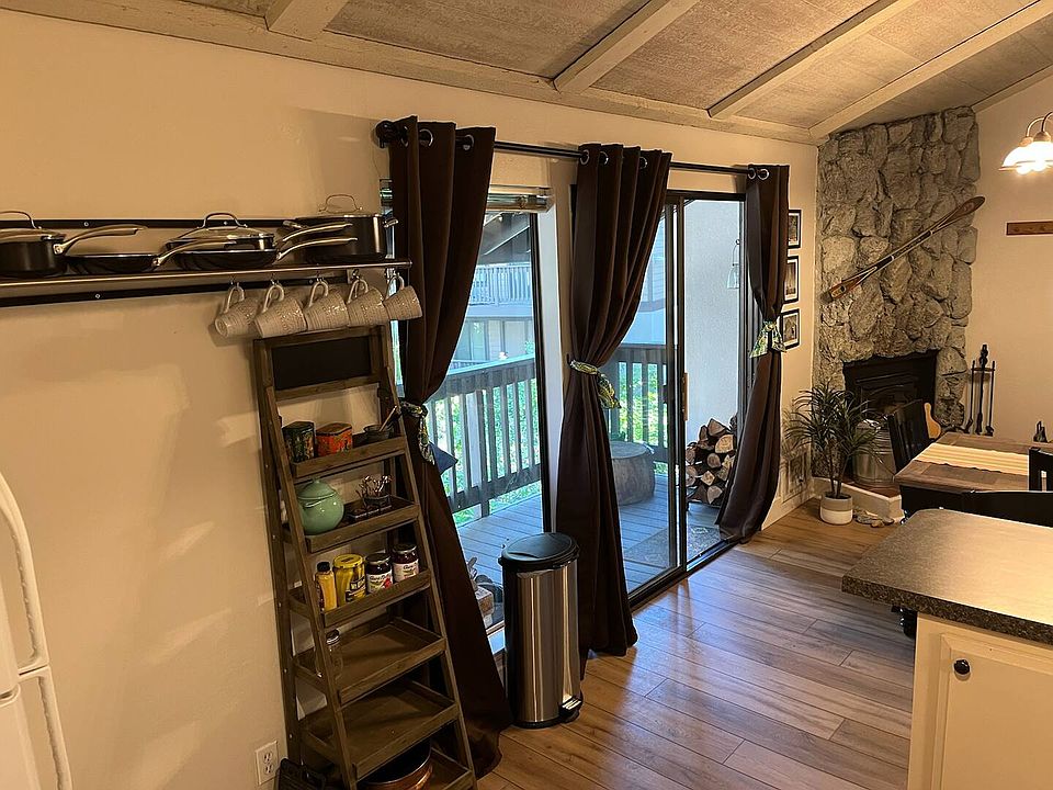 View from kitchen to living and porch areas