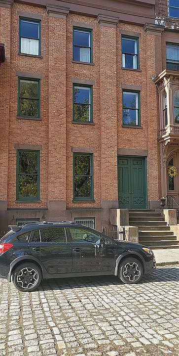 Located on a cobblestone street.