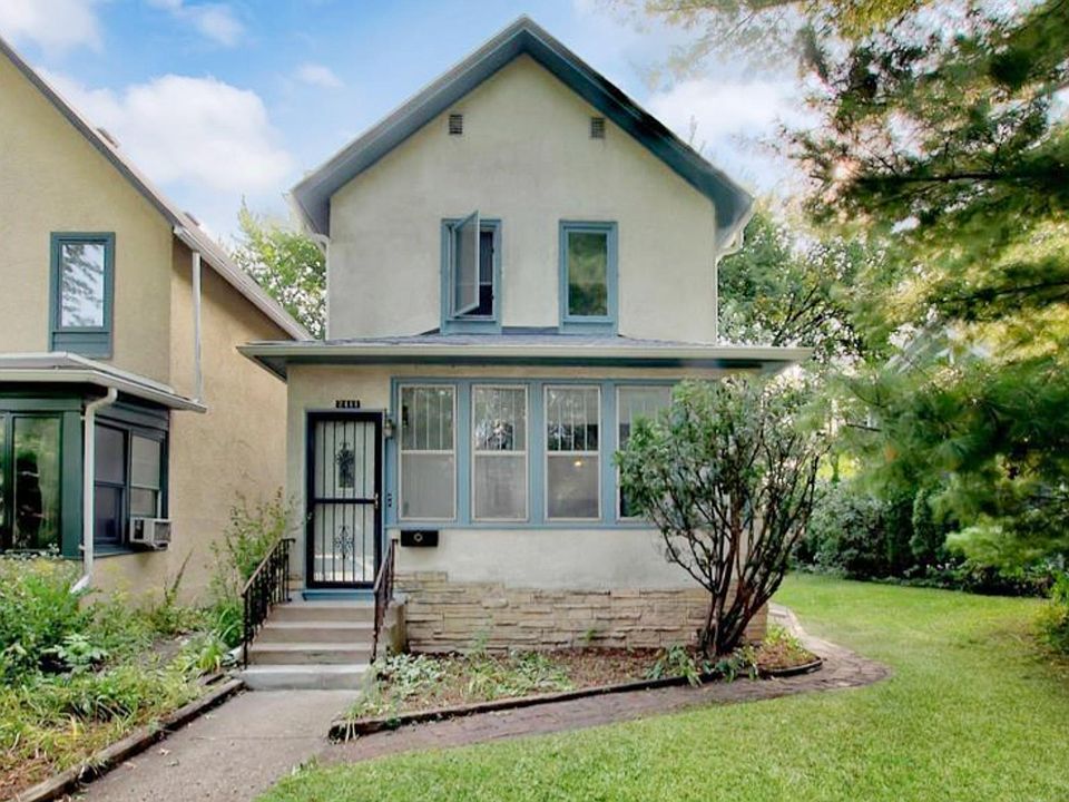 Fenced yard now extends to the front of the house, on the right of this photo.
