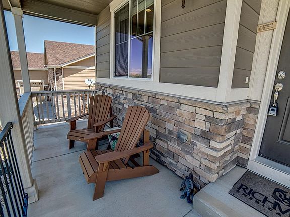 Covered porch, beautiful exterior paint colors and stone