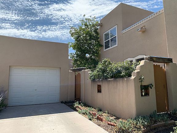 Garage and Walled Side Yard