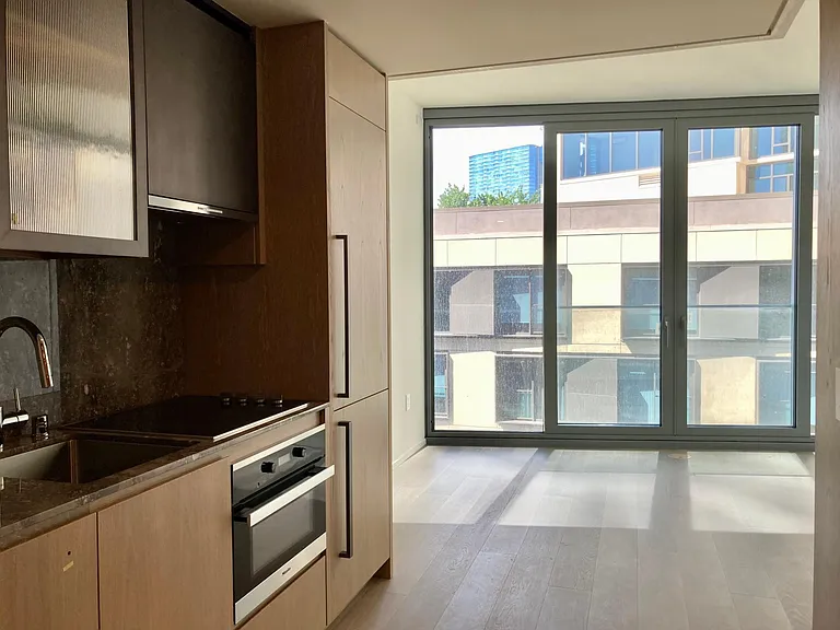 Unit has sliding doors with Juliet balcony for fresh air. Pull down blinds will be installed for privacy.