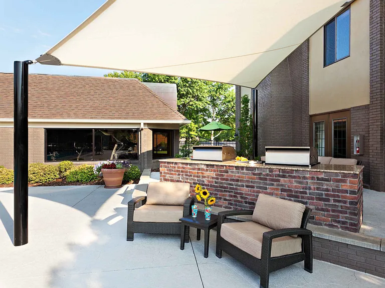 Outdoor grills and shaded lounge area