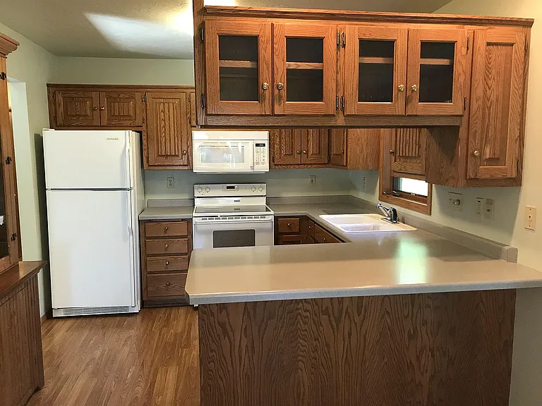 Kitchen with ample cabinets and counter space,