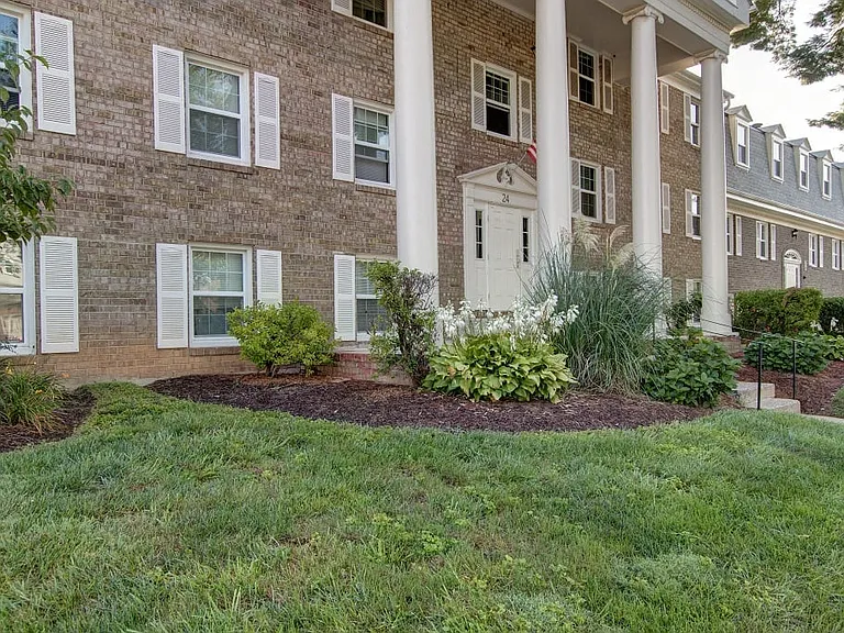 View of building exterior and landscape