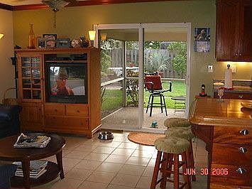 family room with hurricane/PGT glass door