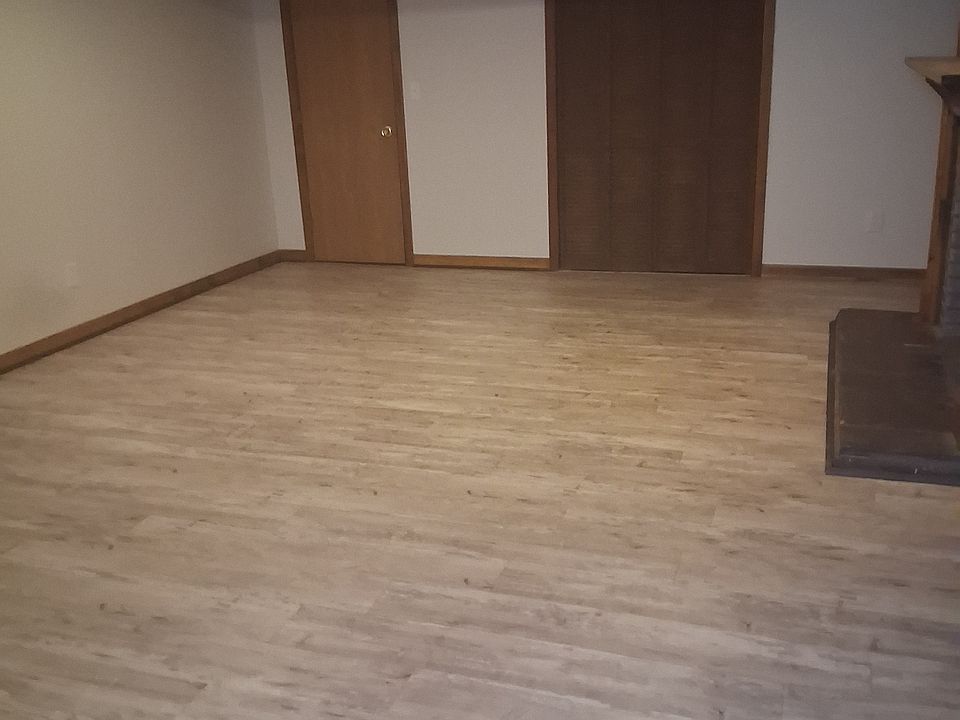 Large family room with laundry room closet.