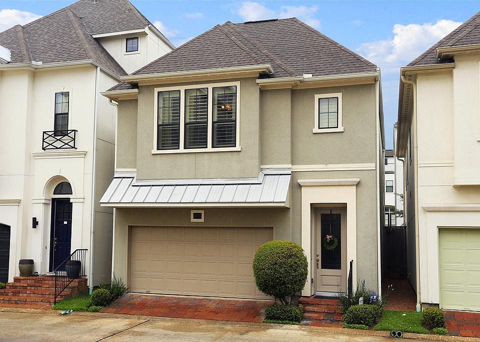 Lakeside living at its finest in the heart of Spring Branch! Elegant, energy efficient, elevator cap