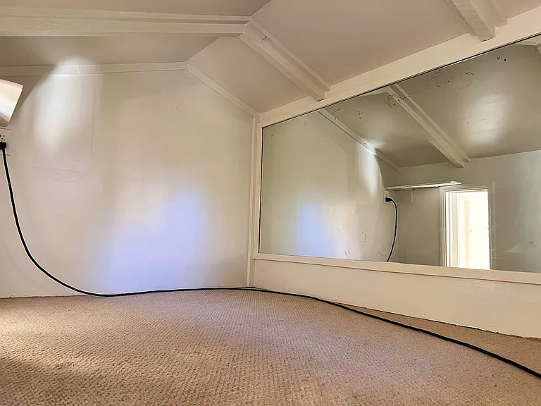 Loft space fits full size mattress or for storage/guests.
