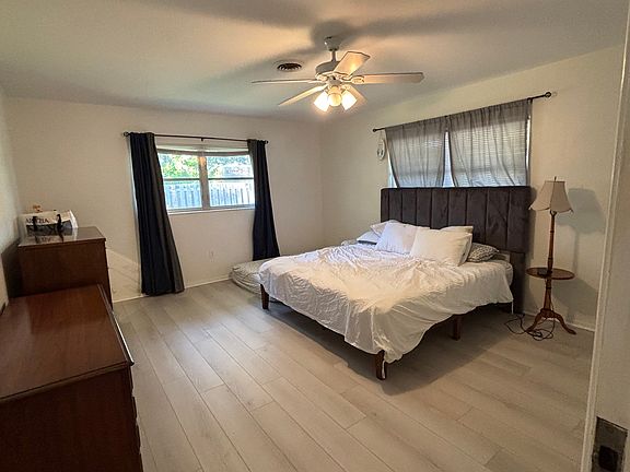 Large master bedroom with walk in closet and in-suite bathroom