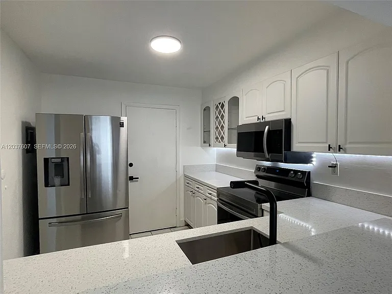8233 Harding Ave #408 — Photo 7