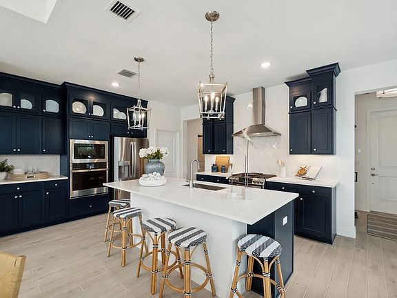Kitchen with pendant lighting and center island