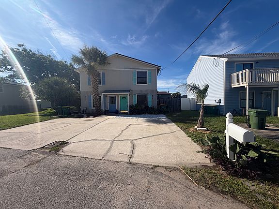 Street view. Driveway for 2 cars