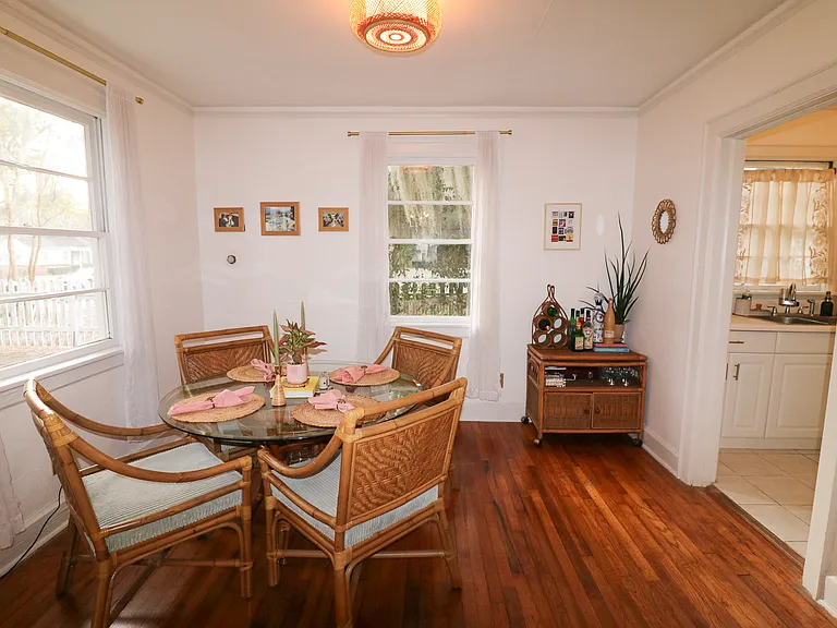 Dining area conveniently located between the living room and kitchen.