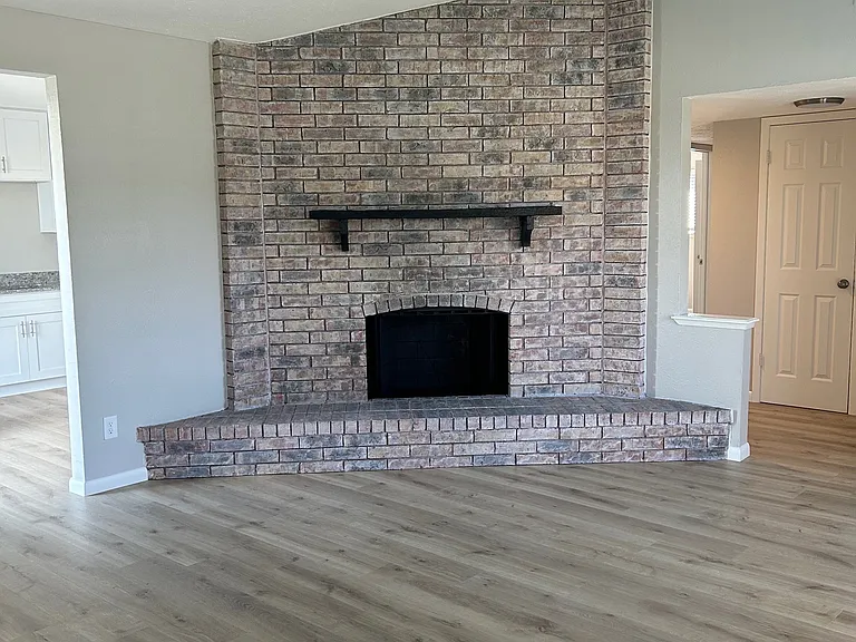 Lovely fireplace in center of Living area