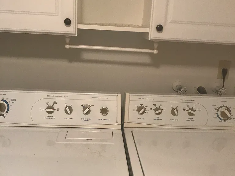 Full size washer and dryer inside condo