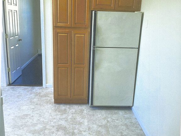Refrigerator with modern wood cabinet