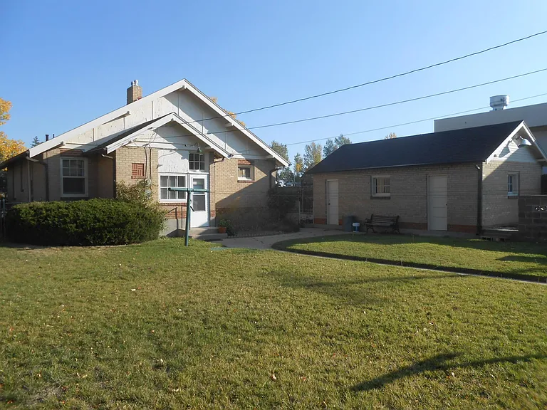 BACK OF HOUSE AND GARAGE