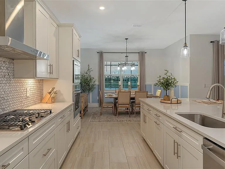5612 Lightning Whelk Ln — Photo 23